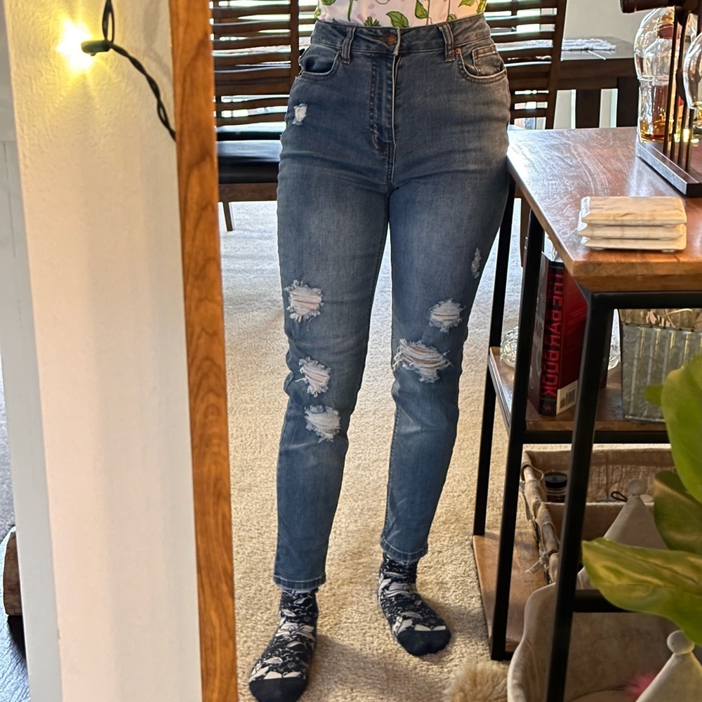 Ripped jeans. High rise
